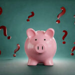 piggy bank with question marks